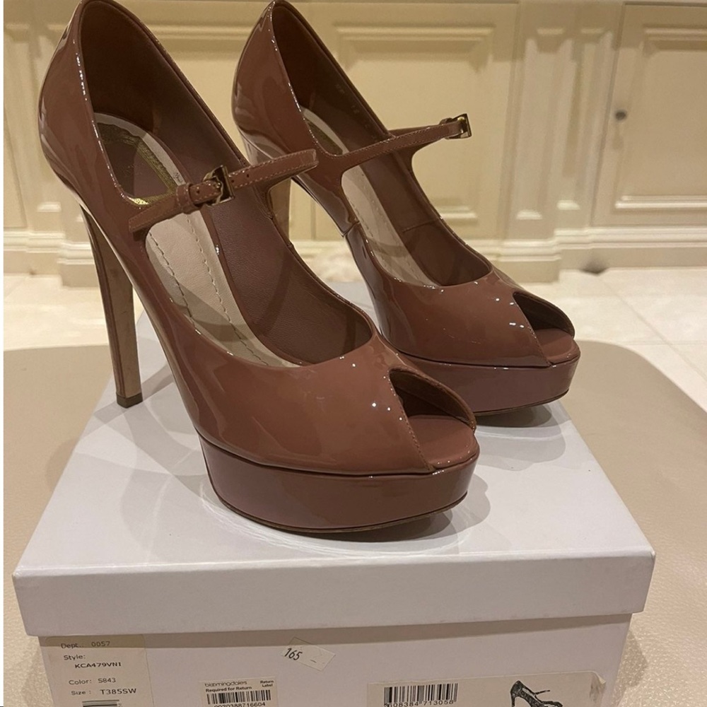 Miss Dior Petal Pink peep toe platform pumps in patent leather.